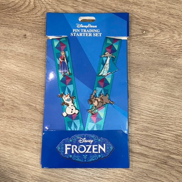 Disney Jewelry - NWT Disney Parks Frozen Pin Trader Starter Set